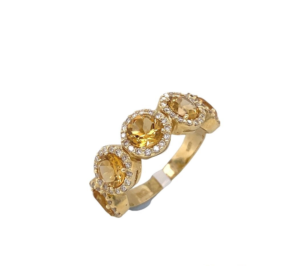 A ring with gems inlaid with diamonds